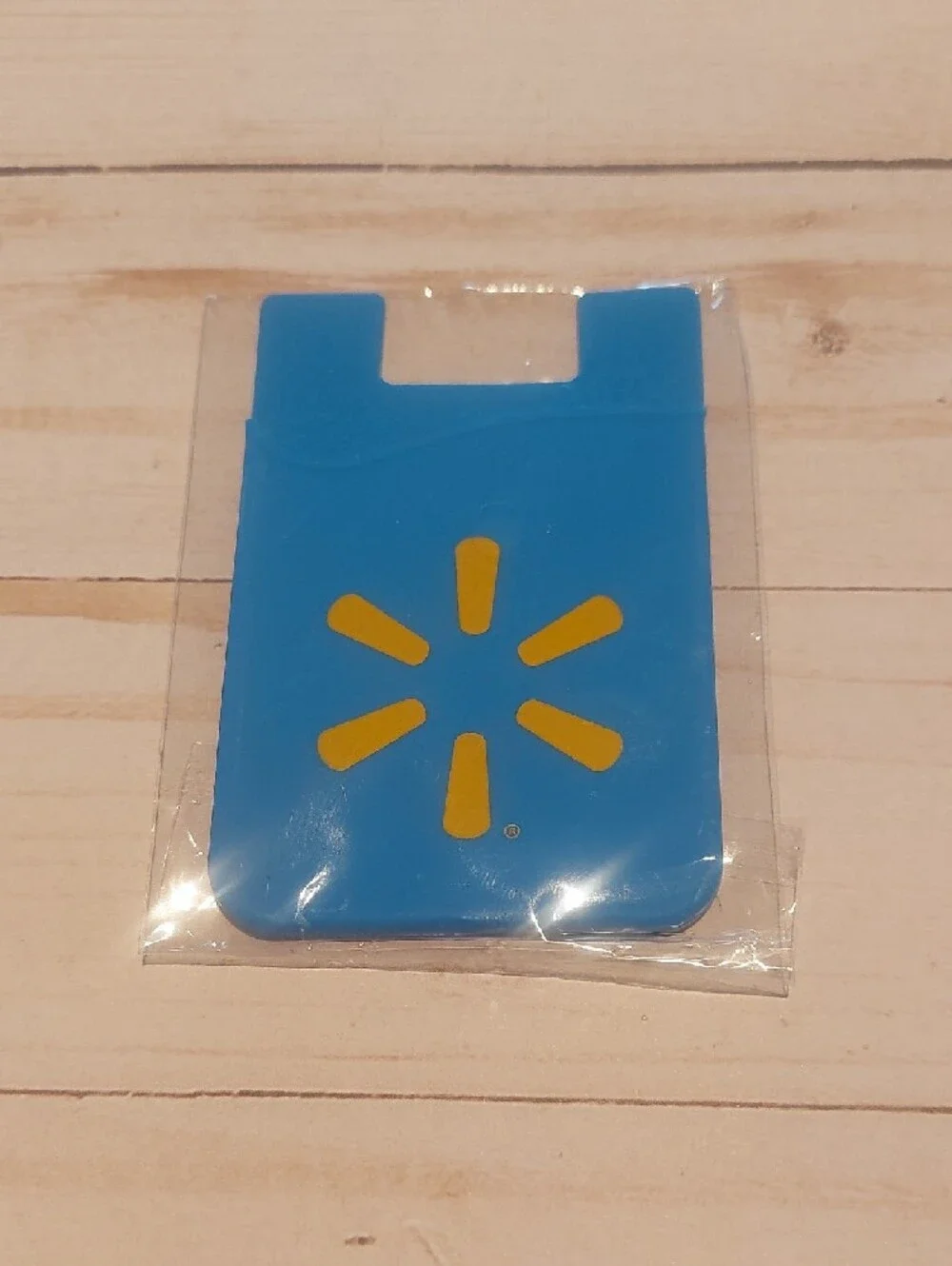 Blue Silicone Stick-On Phone Card Holder with Yellow Logo Accent